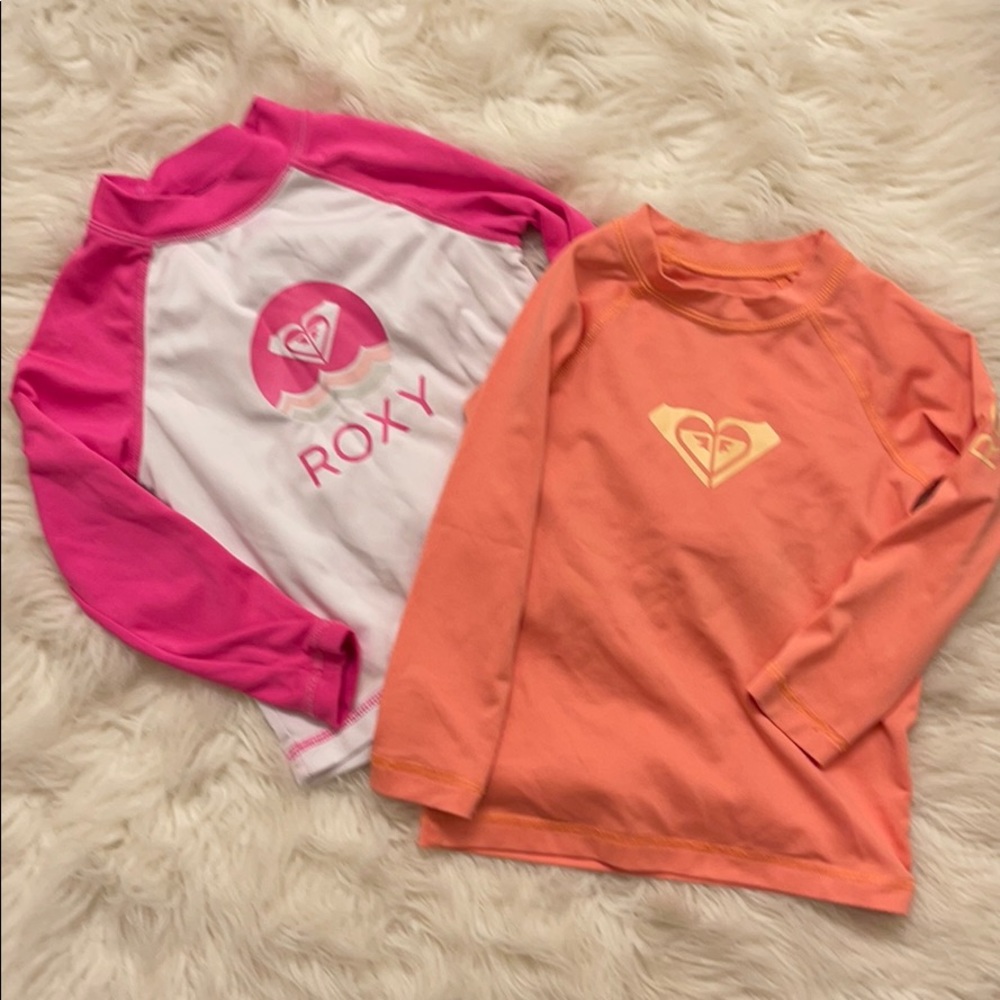 2 Roxy rash guards size 2